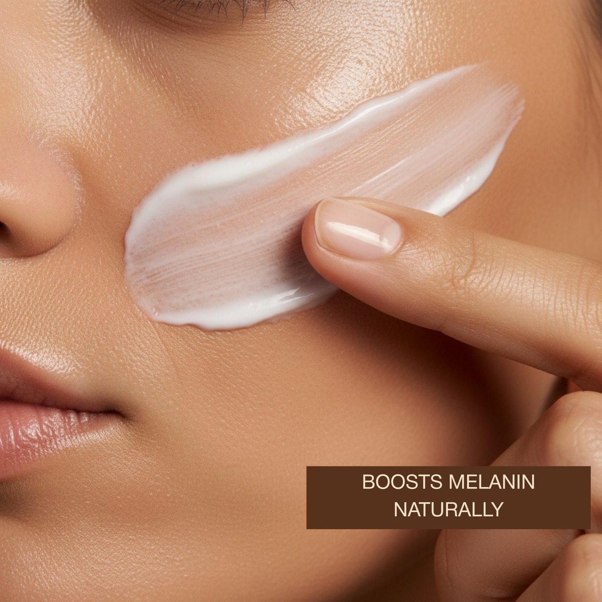 Close-up of woman applying Onyx Anti-Aging Face Tanning Lotion that boosts melanin naturally for even face tan