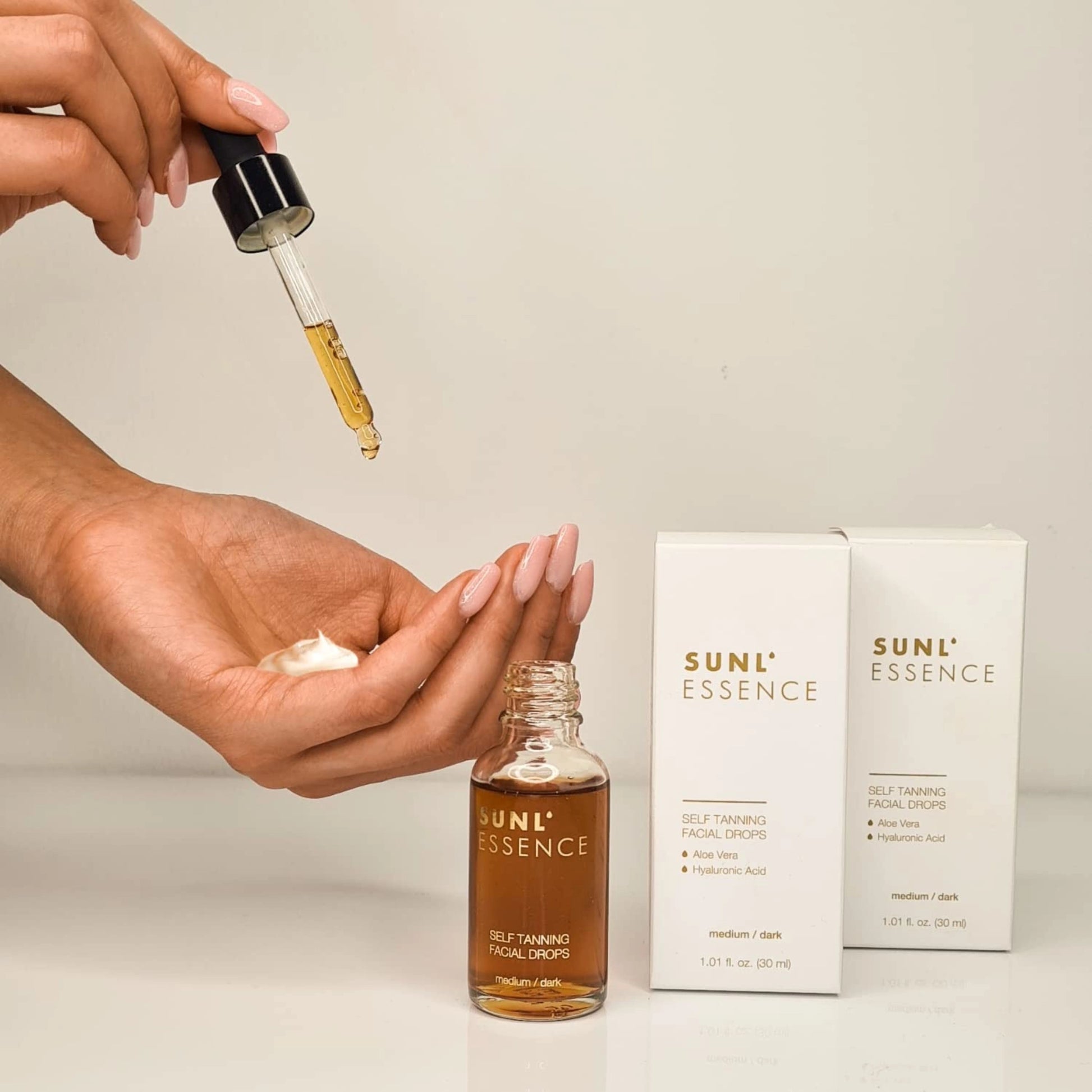 Close-up of Onyx Face Tanning Drops with hydrating formula for a bronzed glow.
