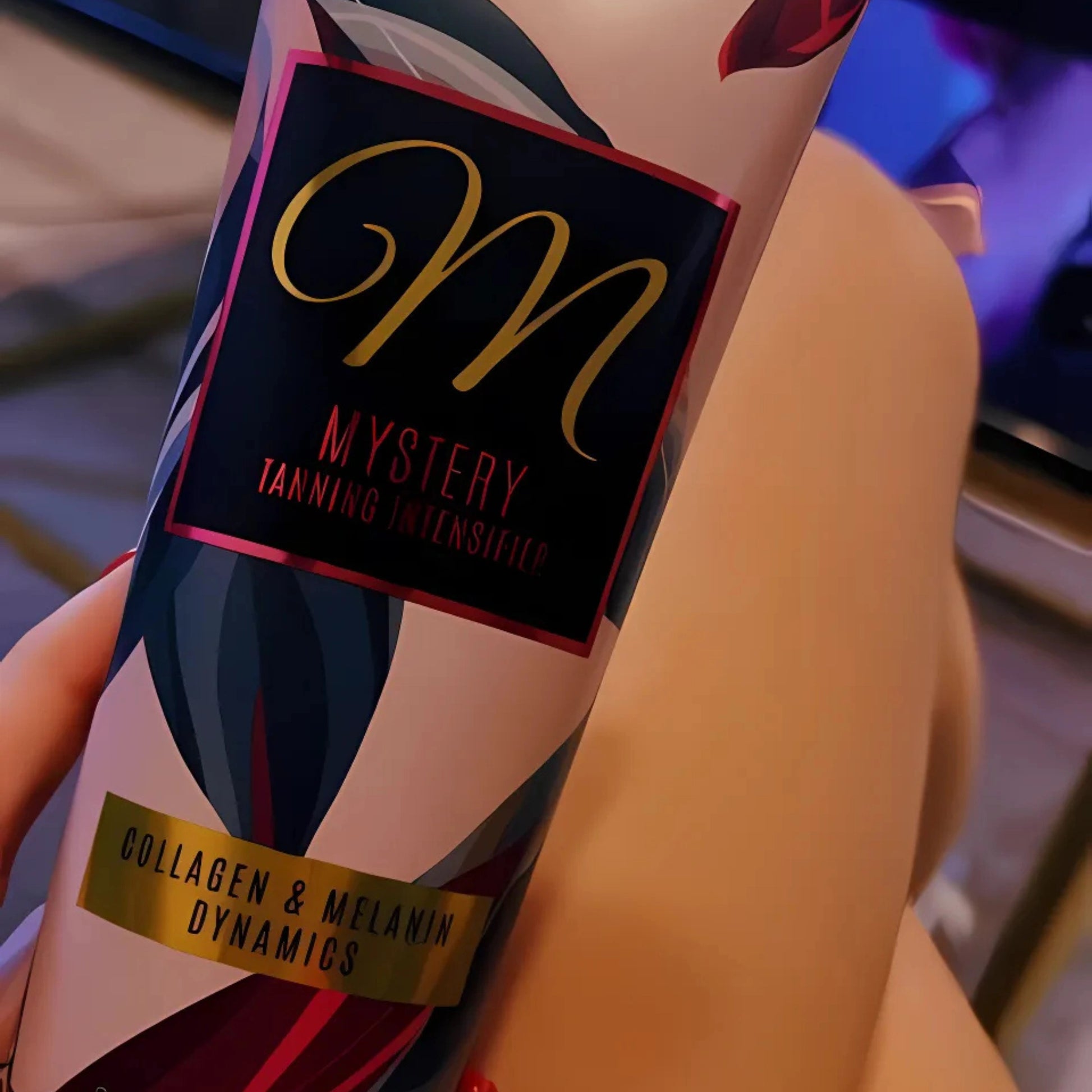 Tube of Onyx Mystery sunbed tanning accelerator cream on leg, close-up of packaging