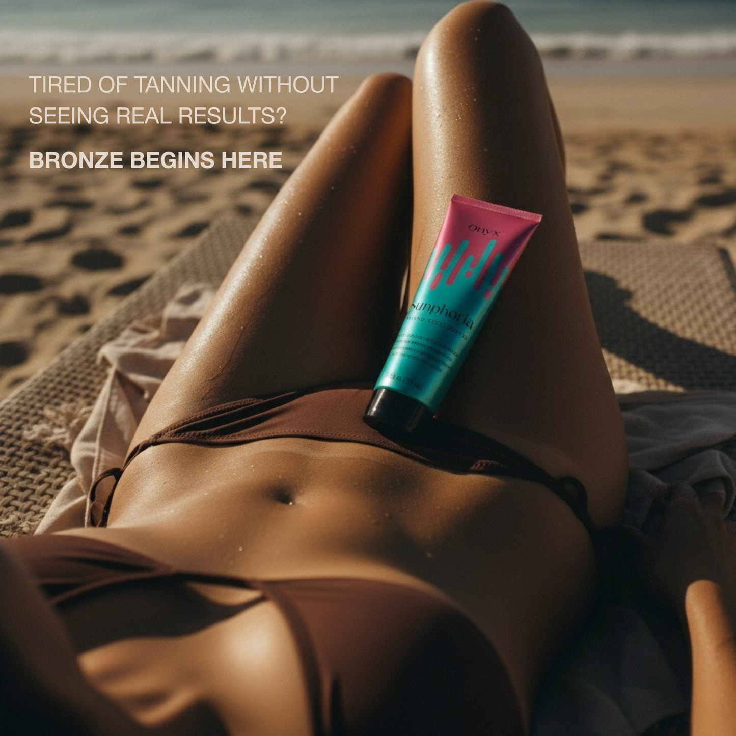 Woman relaxing on a sun lounger with Onyx Sunphoria on her stomach, a tanning lotion helping to achieve faster and more noticeable tanning results.
