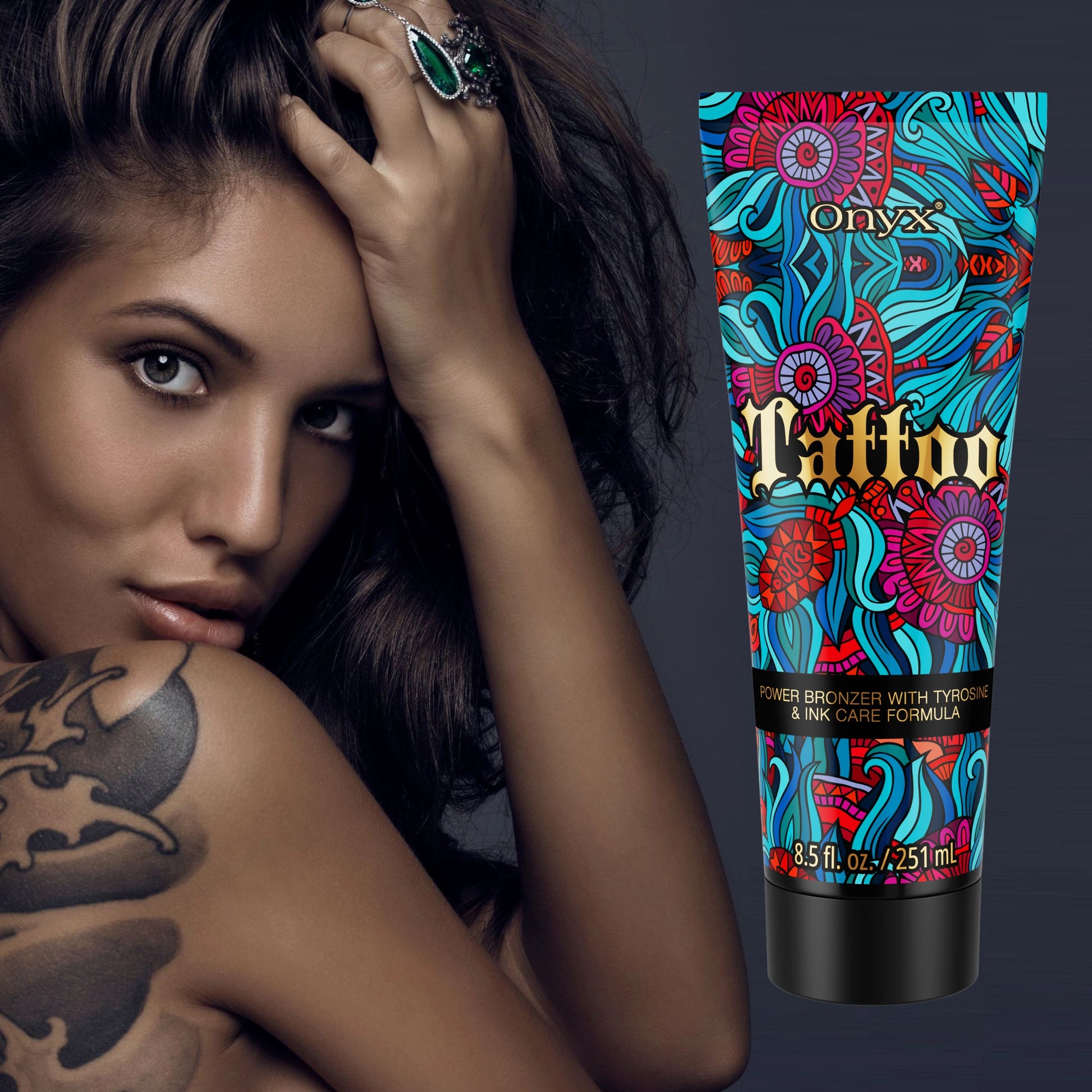 Close-up of a tattooed woman with Onyx Tattoo Tanning Lotion, enhancing ink vibrancy and bronzing results.